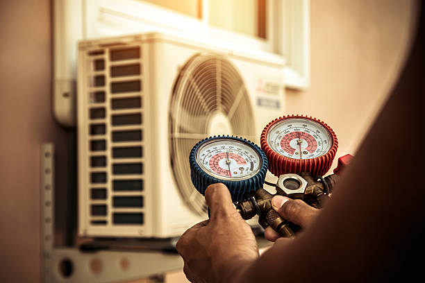 Professional Ac Installation technician working in Falls City, OR